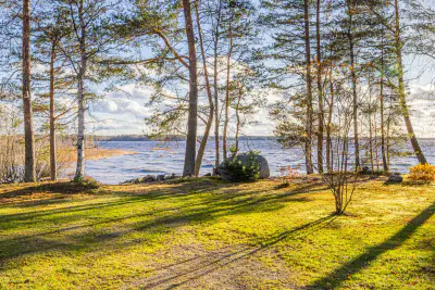 Chalet ~77 m² en finition + cuisine d’été, rive de sable privée sur l’Oulujärvi — Sivolanniemi / Kajaani — 1