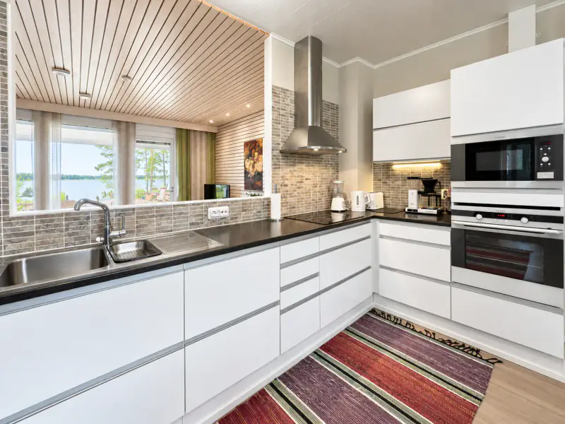 Maison de loisirs 120 m² (2011) avec piscine intérieure + sauna de rive, plage de sable et ponton sur le Pyhävesi, 2 470 m² — Pyhäkoski / Mäntyharju — 12
