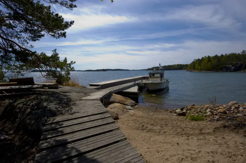 Mökki madriers ronds ~72 m² (1996) + sauna, 3 500 m² (~60 m rive mer) — Vähä-Kaita / Rymättylä — 18