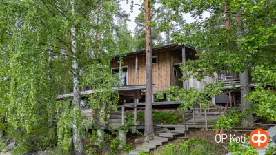 Deux mökki reliés par une terrasse (~73 m², 1975 + 2005) + sauna, 5 860 m² et rive privée rocheuse exposée ouest sur le Lietvesi (Saimaa) — Lintusalo / Puumala — 1