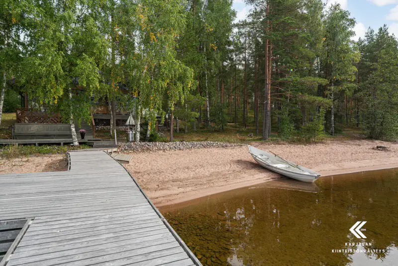 Hirsihuvila 60 m², plage sable Suur-Saimaa, 1,05 ha (2 lots) — Taipalsaari — 2